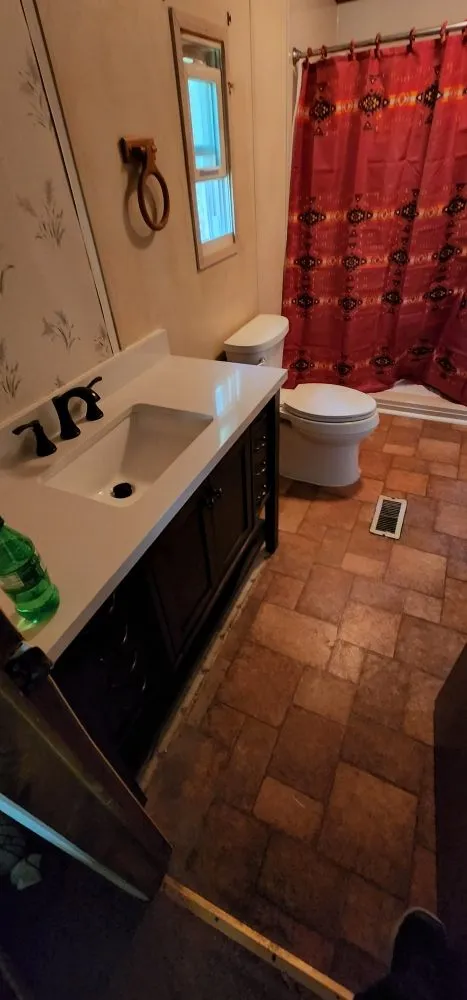 Slide of 1st String Plumbing and Heating