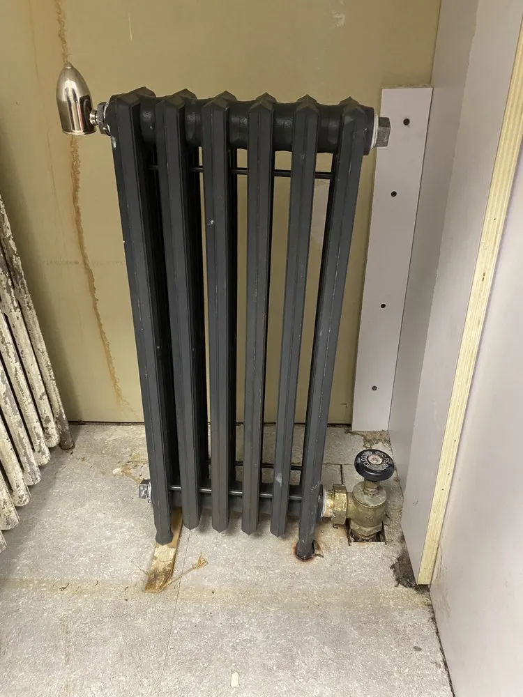 Slide of 2 Brothers Piping & Heating