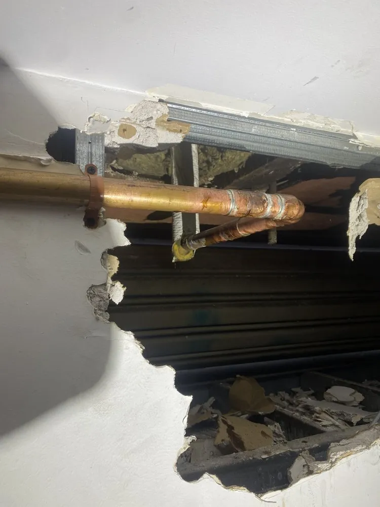 Slide of 2 Brothers Piping & Heating