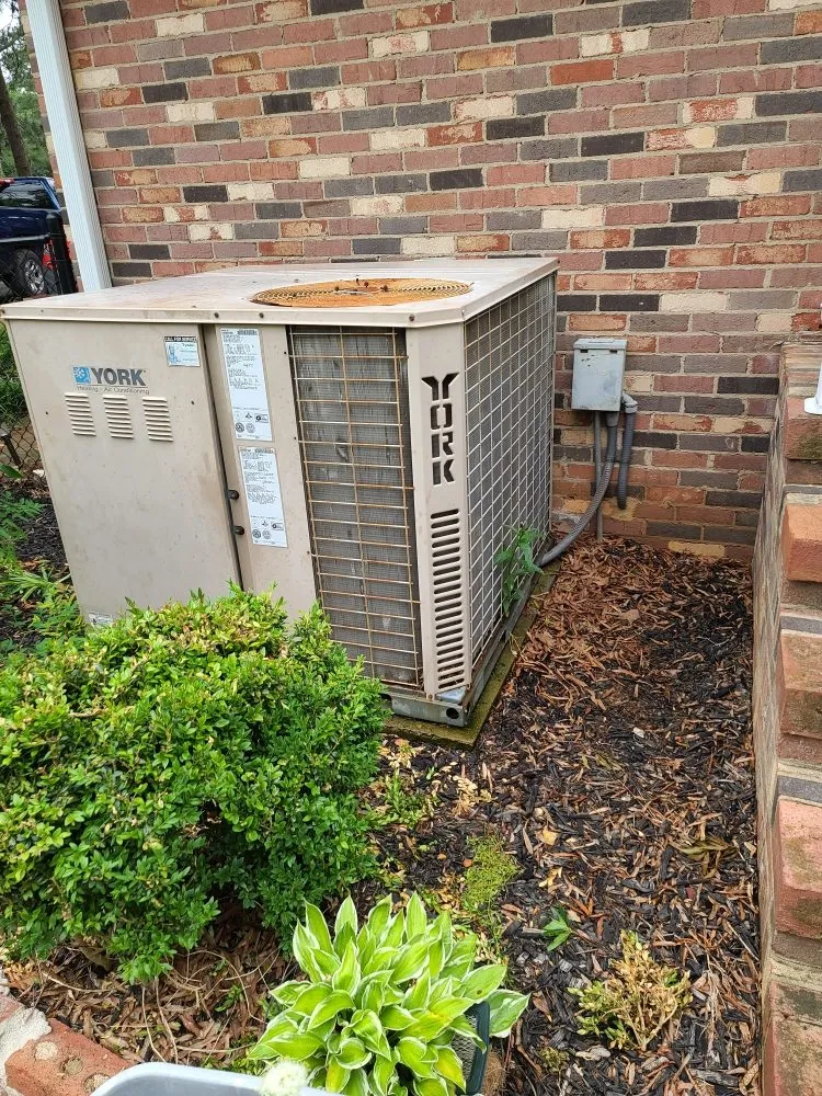 Slide of 2 Conditions Heating Air and Garage Door