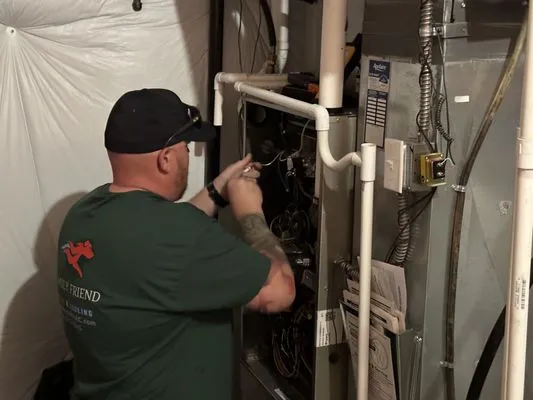 A Family Friend Heating and Cooling Logo