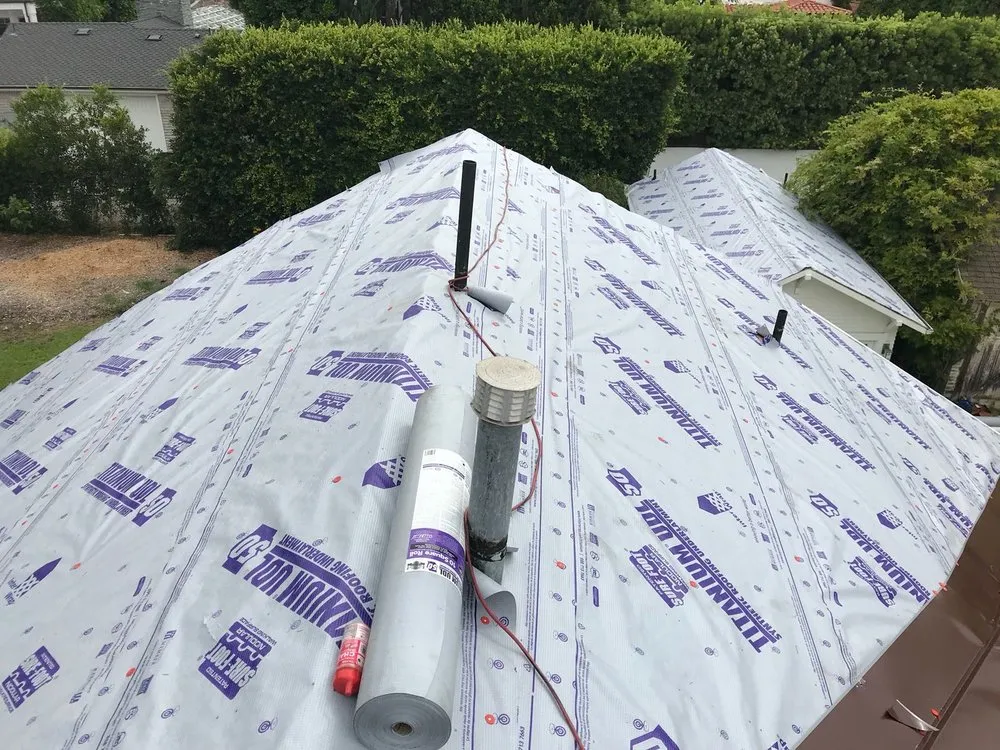 Slide of A1 American Roofing