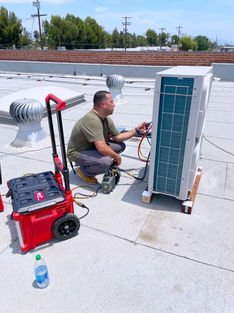 Slide of AB AC Air Conditioning Specialists