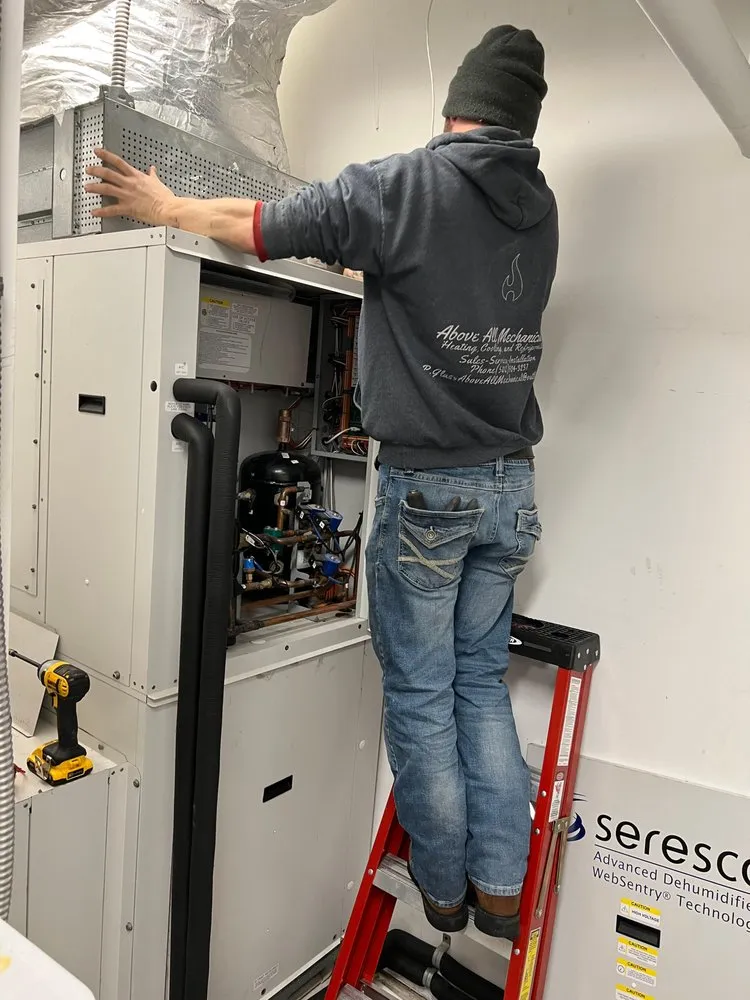 Slide of Above All Mechanical