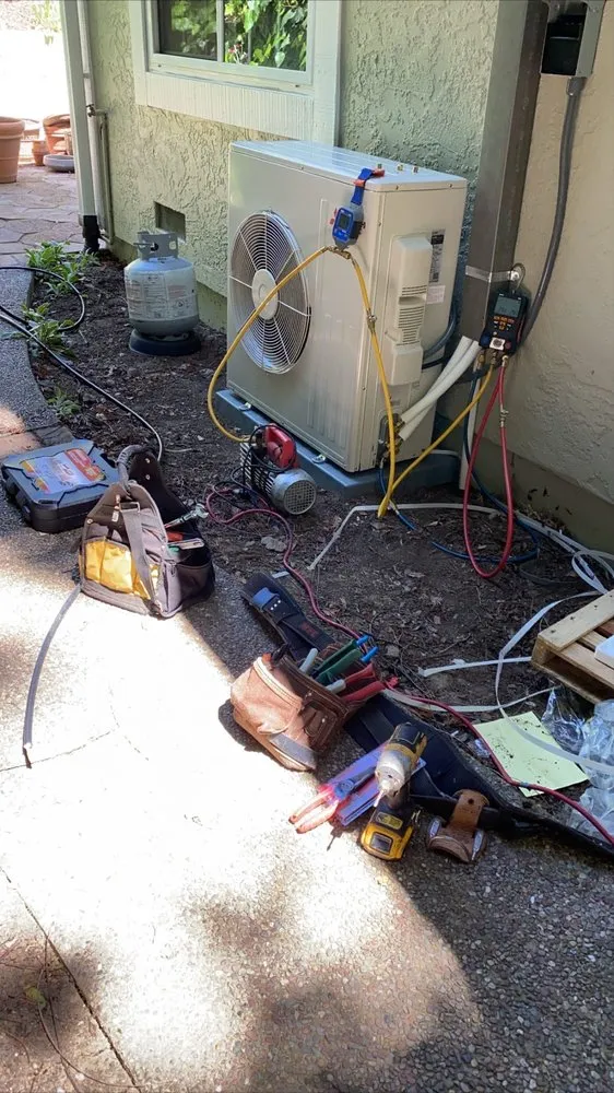 Slide of AC DC Heating & Air Conditioning