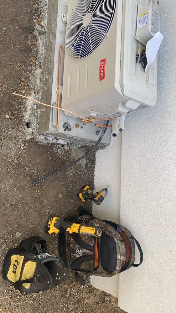 Slide of AC DC Heating & Air Conditioning