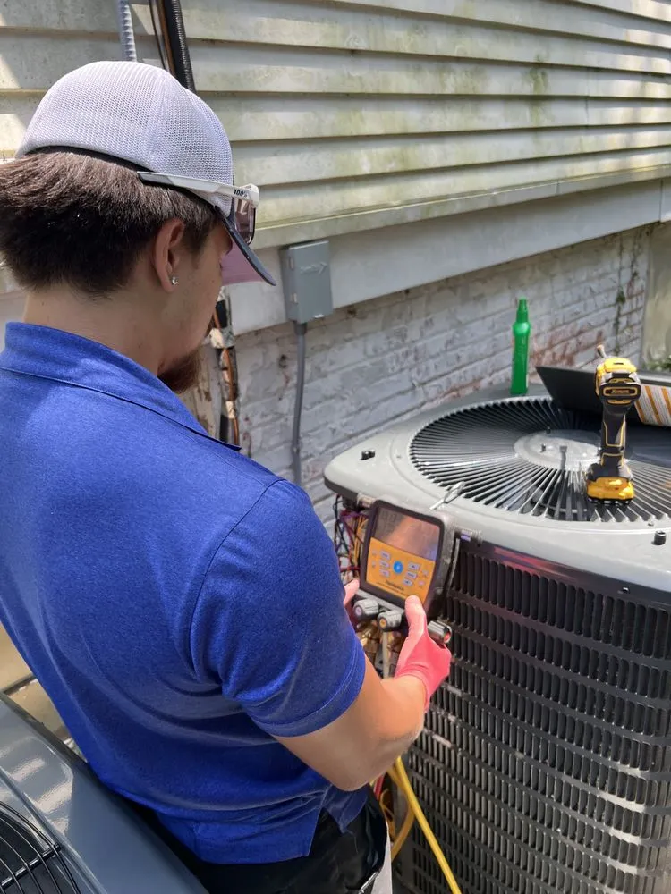 Slide of A/C Man Heating and Air