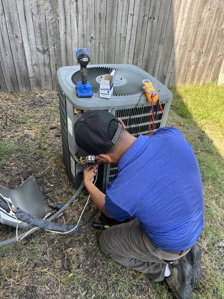 Slide of A/C Man Heating and Air
