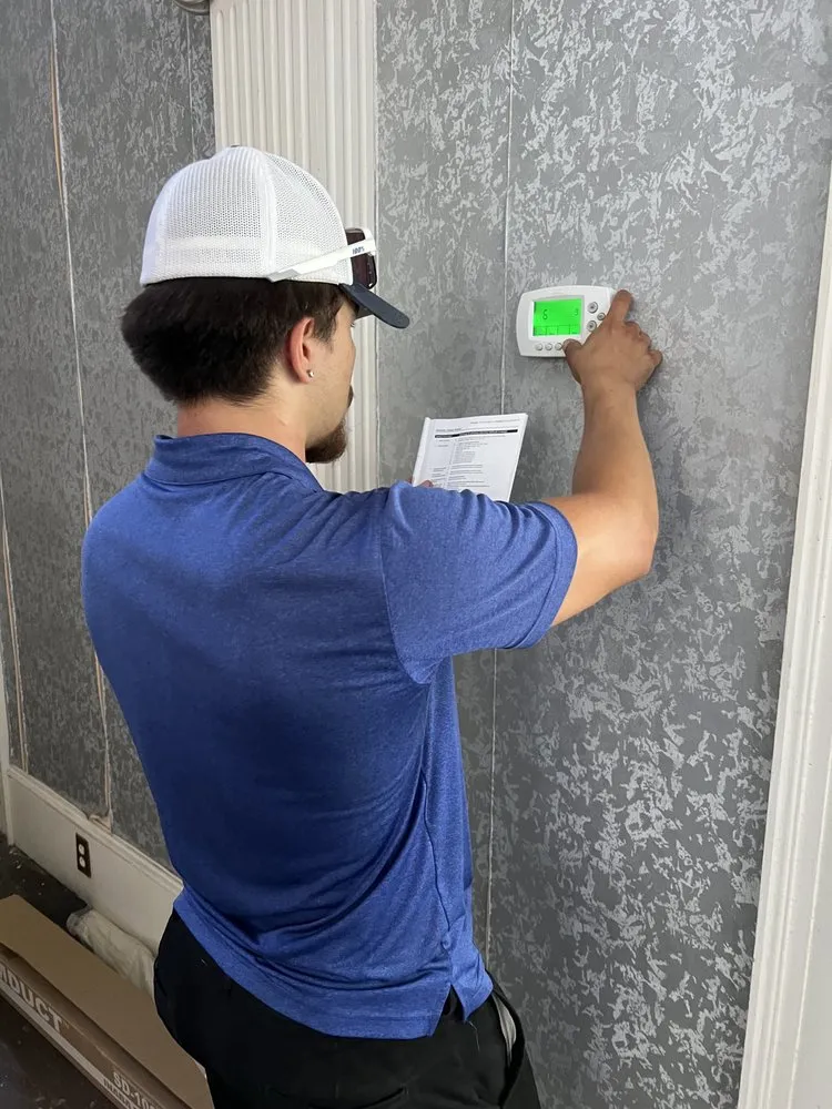 Slide of A/C Man Heating and Air