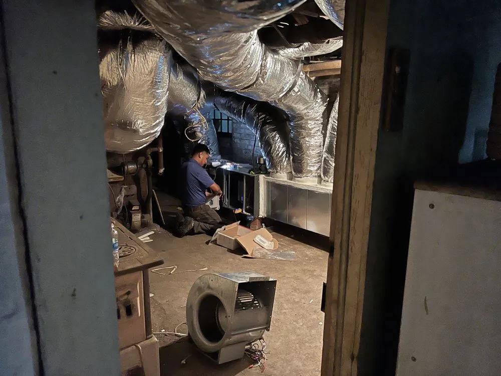 Slide of A/C Man Heating and Air