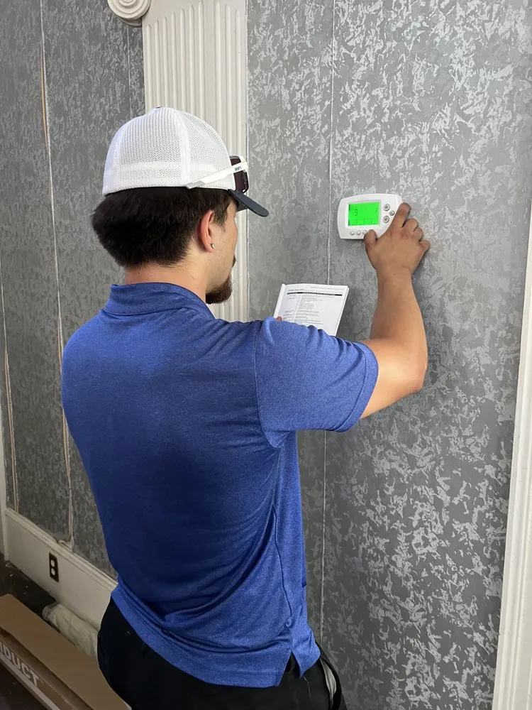 Slide of A/C Man Heating and Air