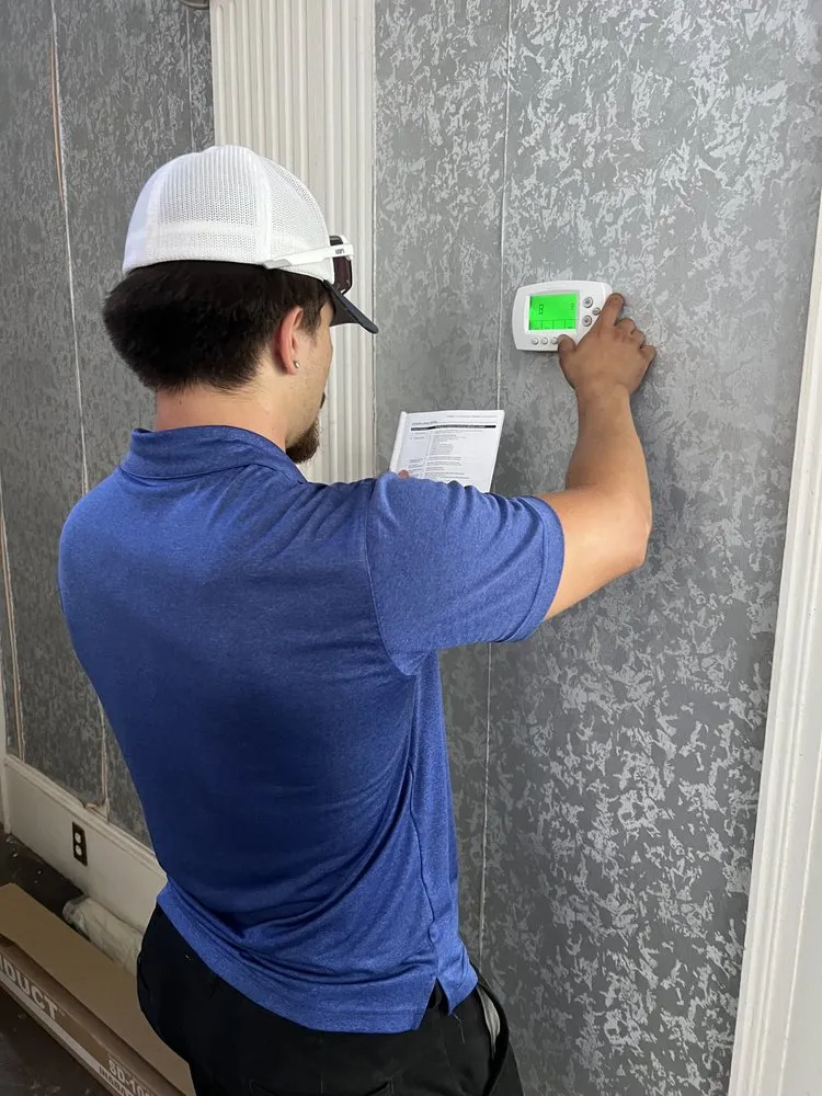 Slide of A/C Man Heating and Air