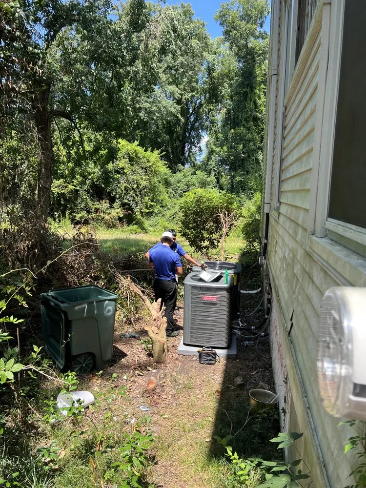 Slide of A/C Man Heating and Air