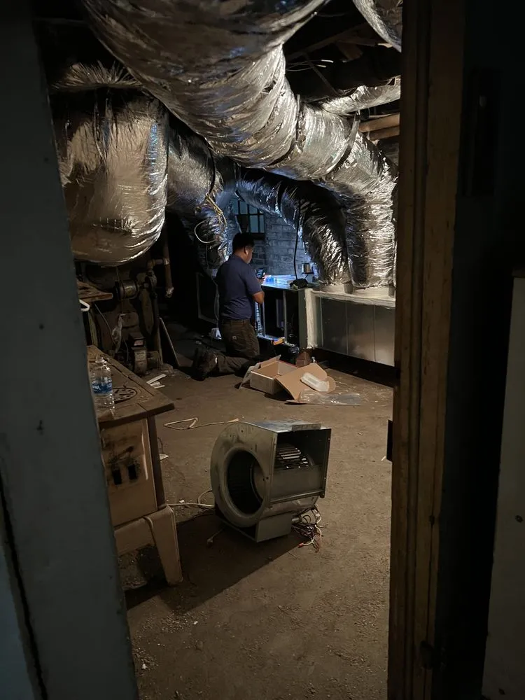 Slide of A/C Man Heating and Air