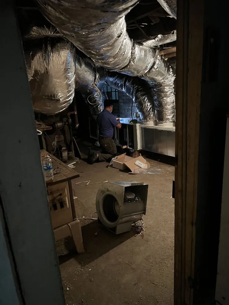 Slide of A/C Man Heating and Air