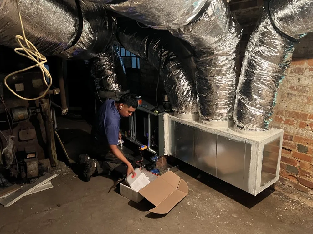 Slide of A/C Man Heating and Air