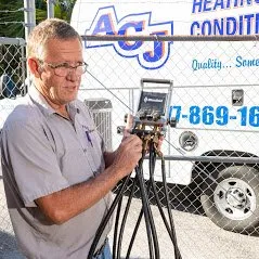 Slide of ACJ Heating & Air Conditioning
