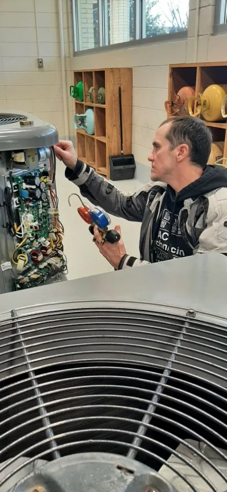 Slide of Action Air & Heating