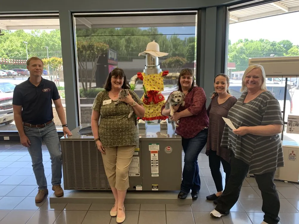 Slide of Action Air Conditioning Service