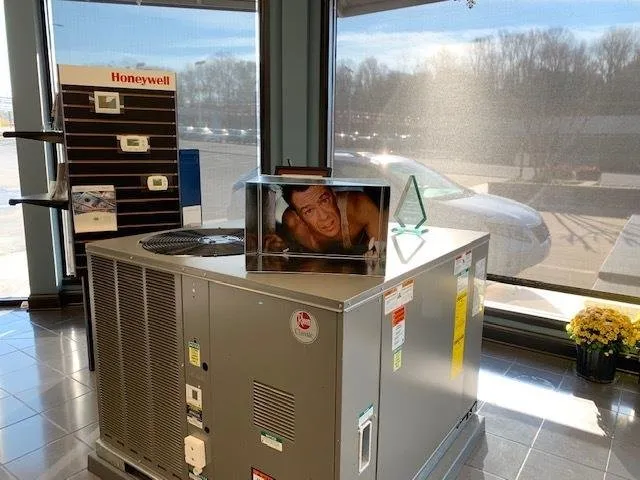 Slide of Action Air Conditioning Service