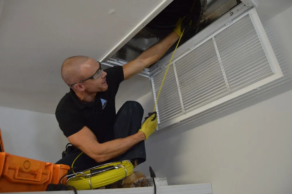 Slide of Action Duct Cleaning