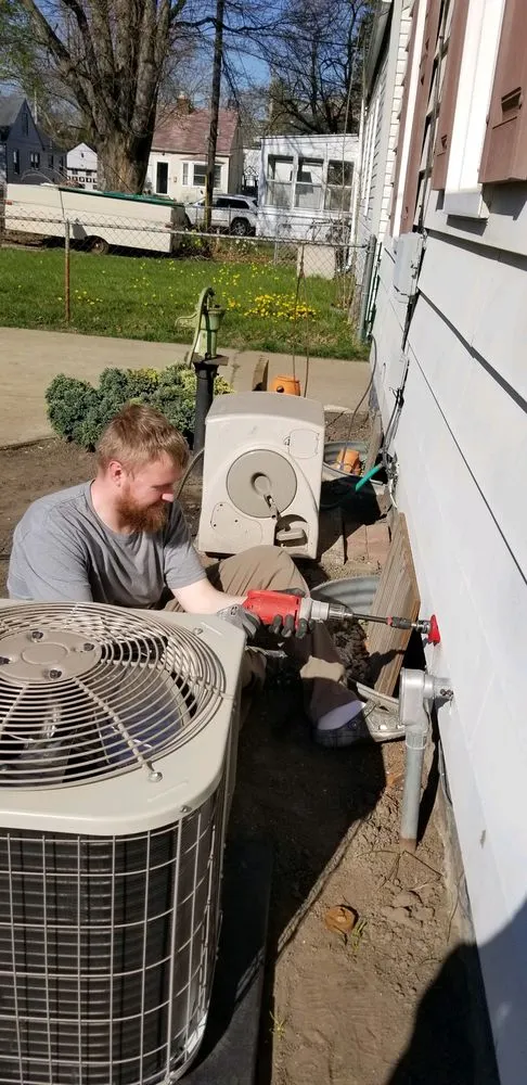 Slide of Action Heating, Air Conditioning & Electrical