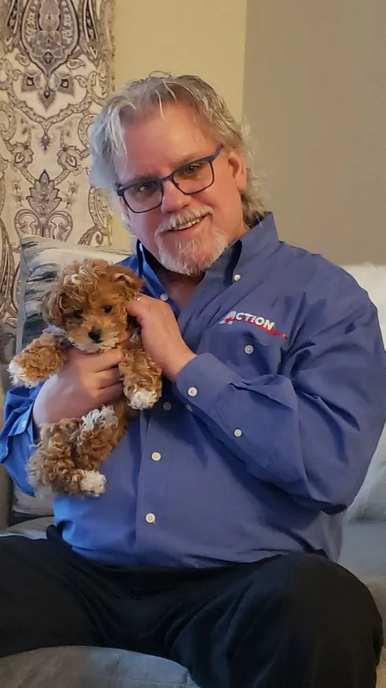 Slide of Action Heating, Air Conditioning & Electrical