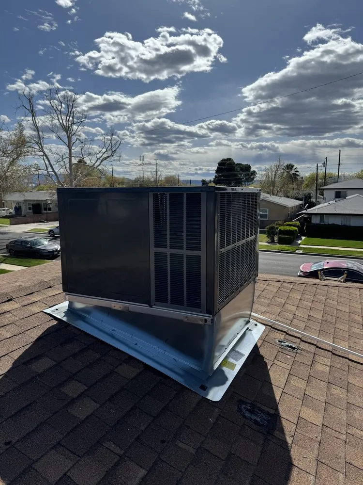 Slide of Adam Heating and Air Conditioning