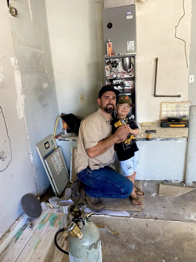 Slide of Adam Heating and Air Conditioning