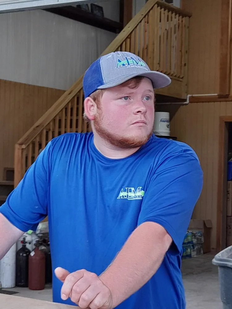 Slide of AIM A/C and Heating Services