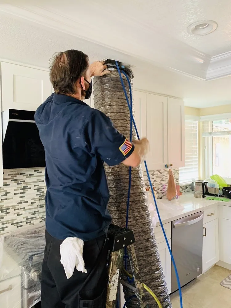 Slide of Air Ducks Duct Cleaning