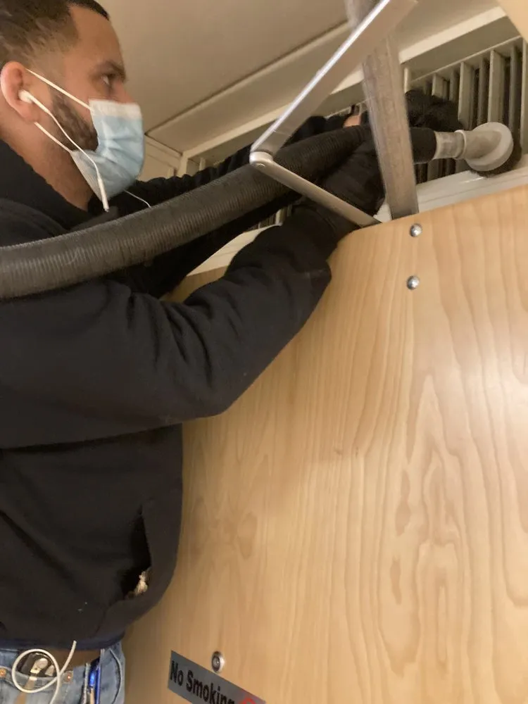 Slide of Air Duct Cleaning of New England