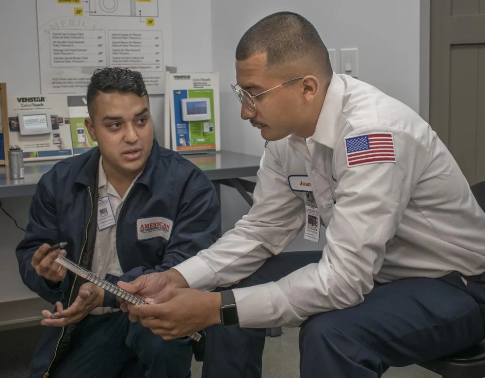 Slide of American AC Heat Plumbing