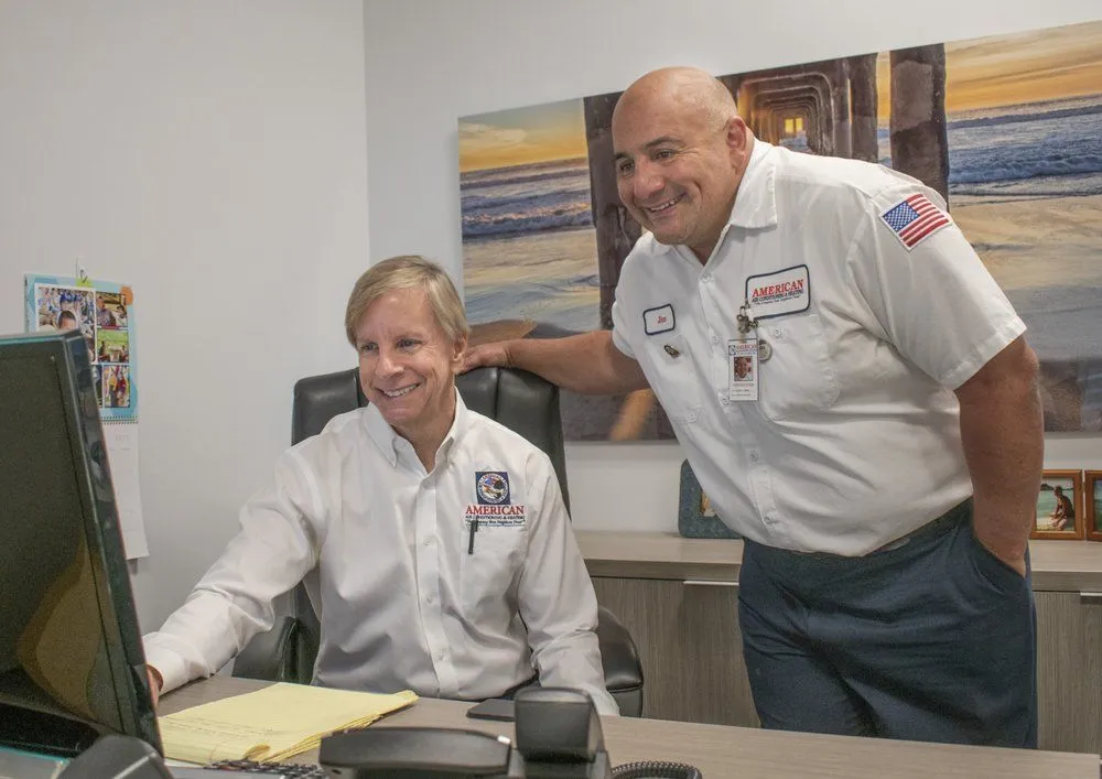 Slide of American AC Heat Plumbing