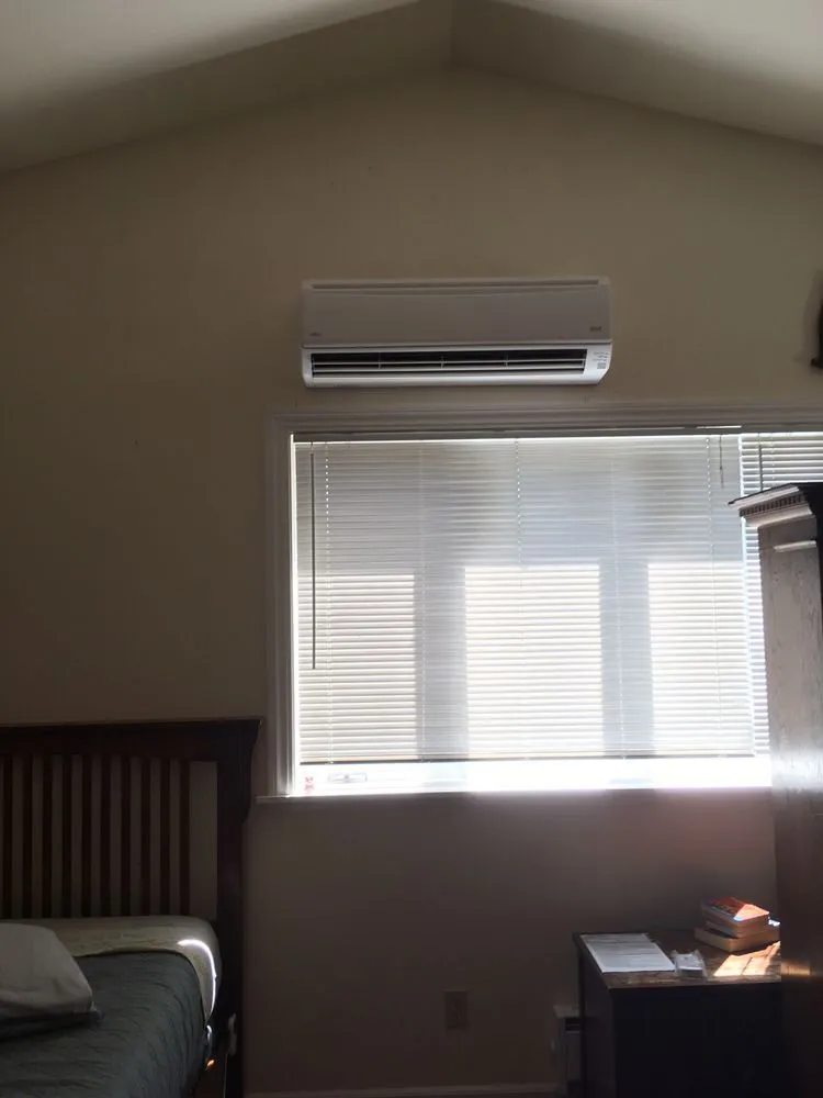 Slide of Arm Heating & Air Conditioning