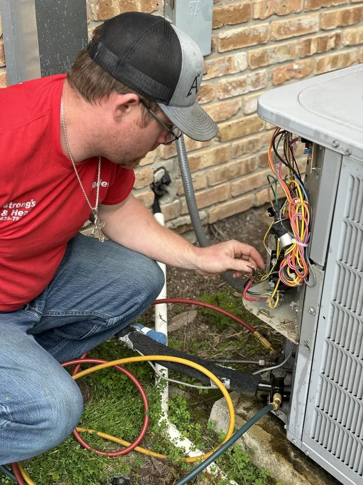 Slide of Armstrong's AC & Heat