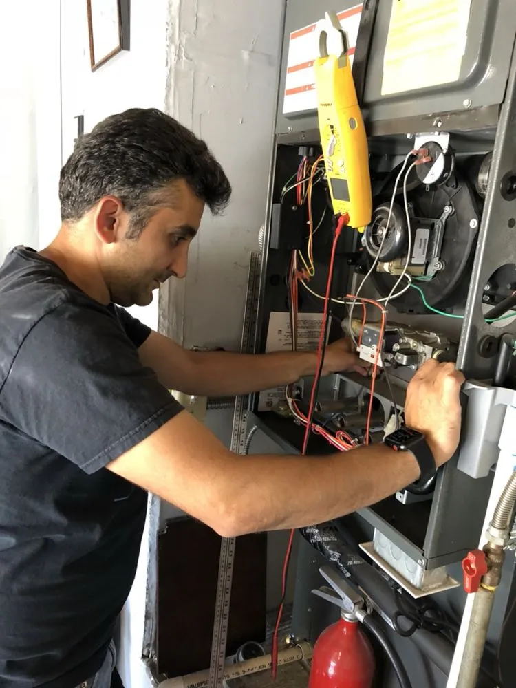 Slide of Art's Heating & Cooling