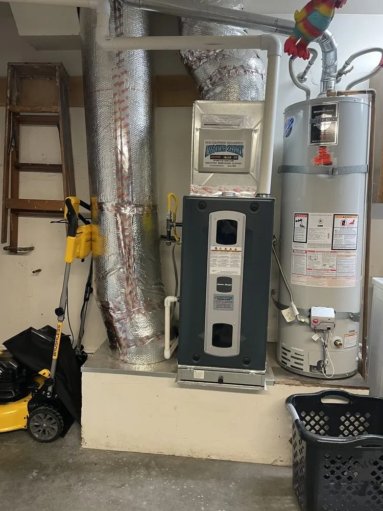 Slide of Associated Services Heating, Solar & Air