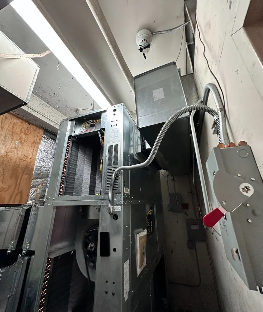 Slide of AT Heating and Air