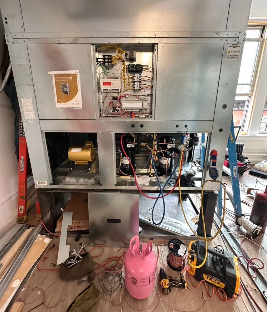 Slide of AT Heating and Air