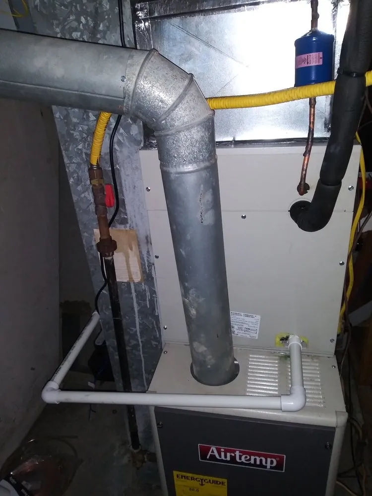 Slide of Bell Heating and AC