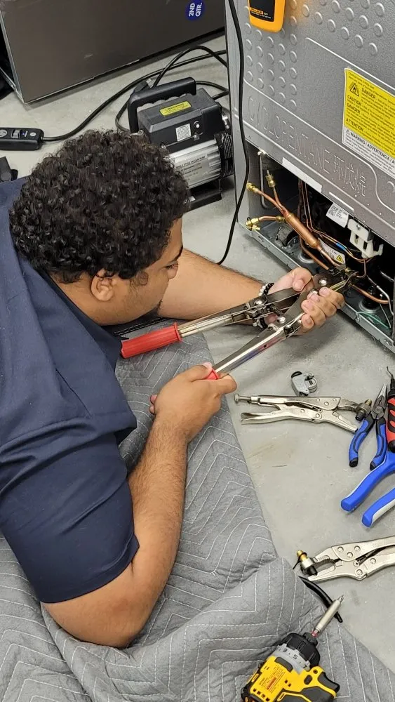 Slide of Brown Appliance Guys