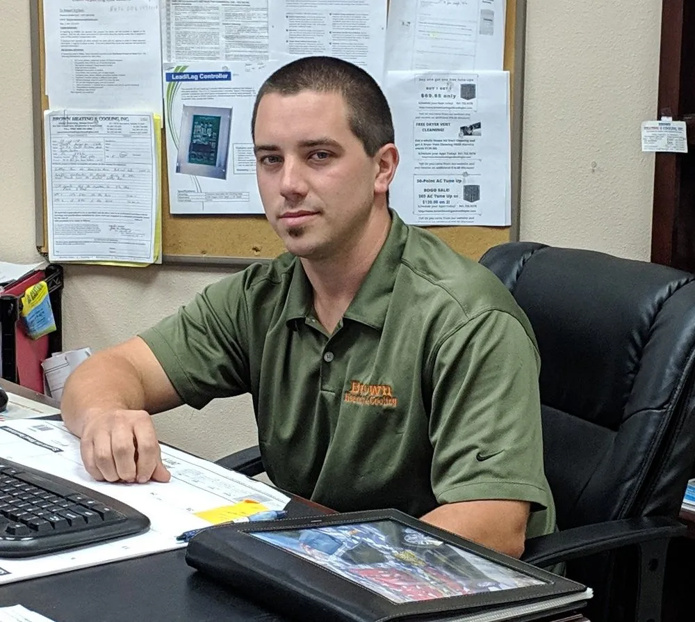 Slide of Brown Heating, Cooling, and Plumbing