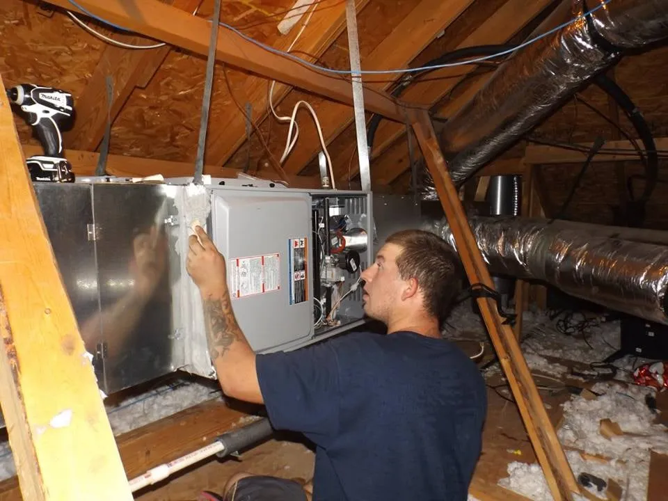 Slide of Burkham's AC and Heating