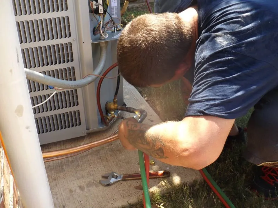 Slide of Burkham's AC and Heating