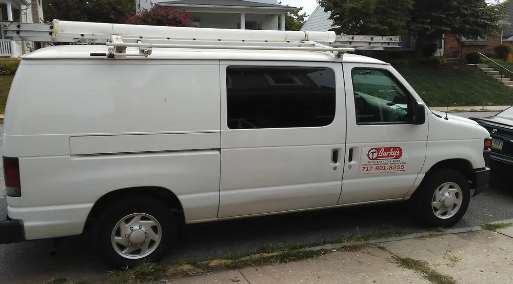 Slide of Burky's Maintenance-N-More