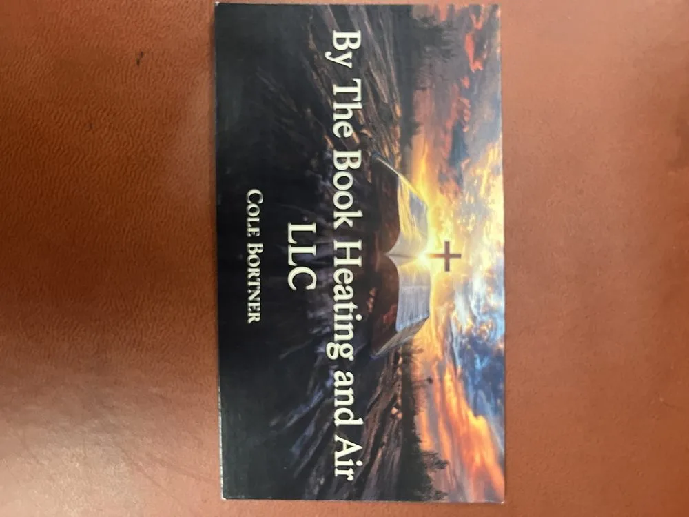 Slide of By The Book Heating And Air