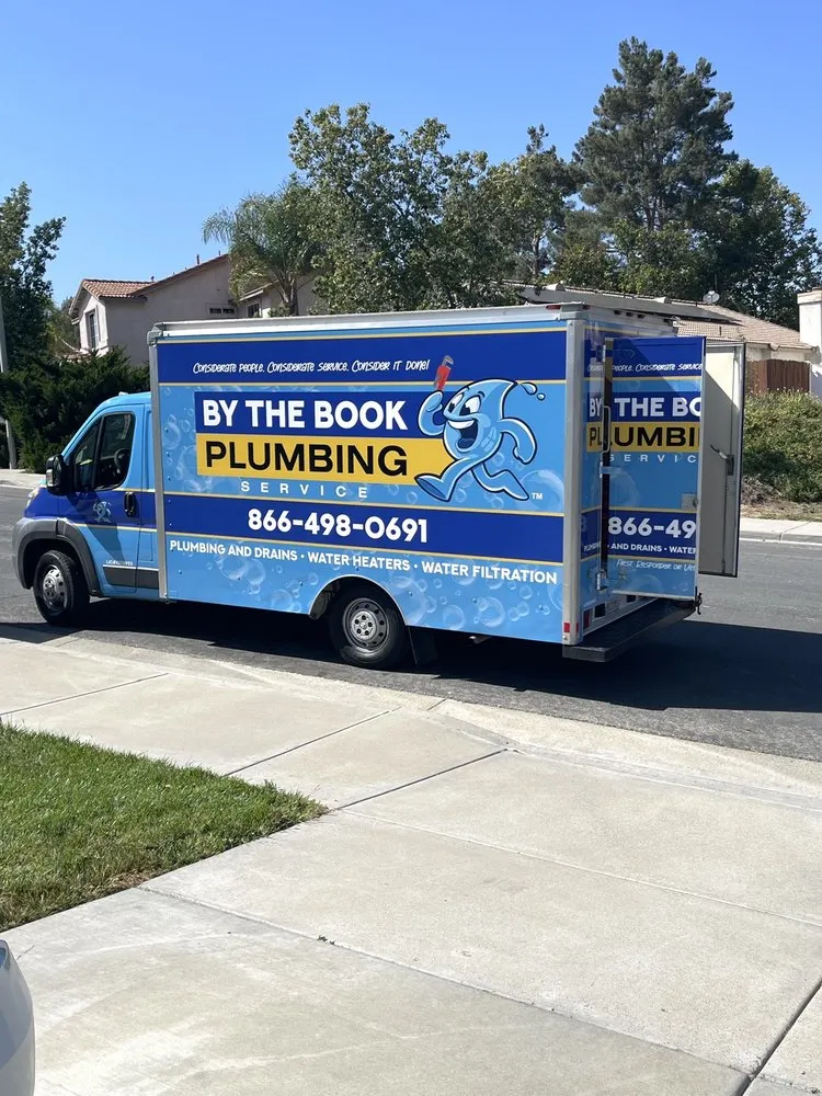 Slide of By The Book Plumbing Heating Air Conditioning