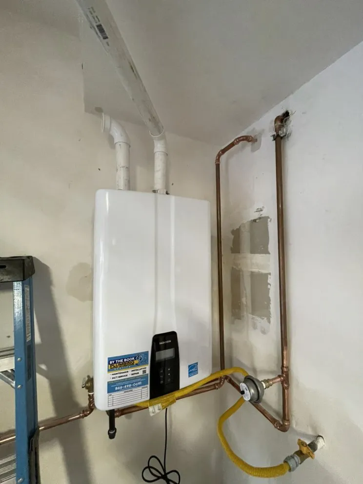 Slide of By The Book Plumbing Heating Air Conditioning