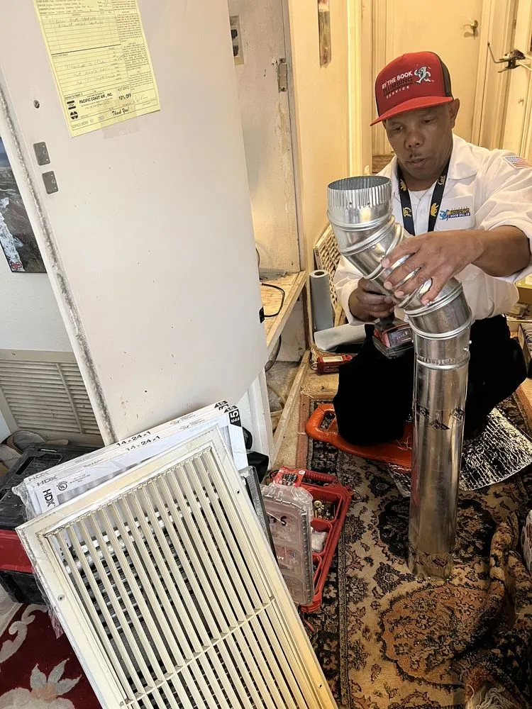 Slide of By The Book Plumbing Heating Air Conditioning